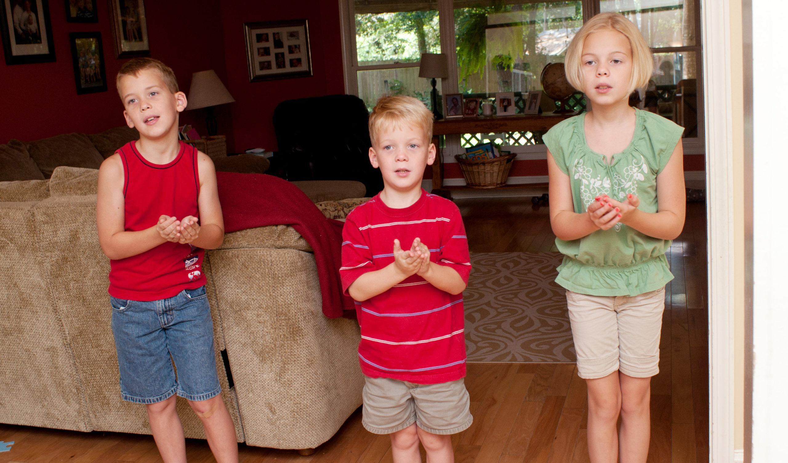 kids working on memory work hand motions